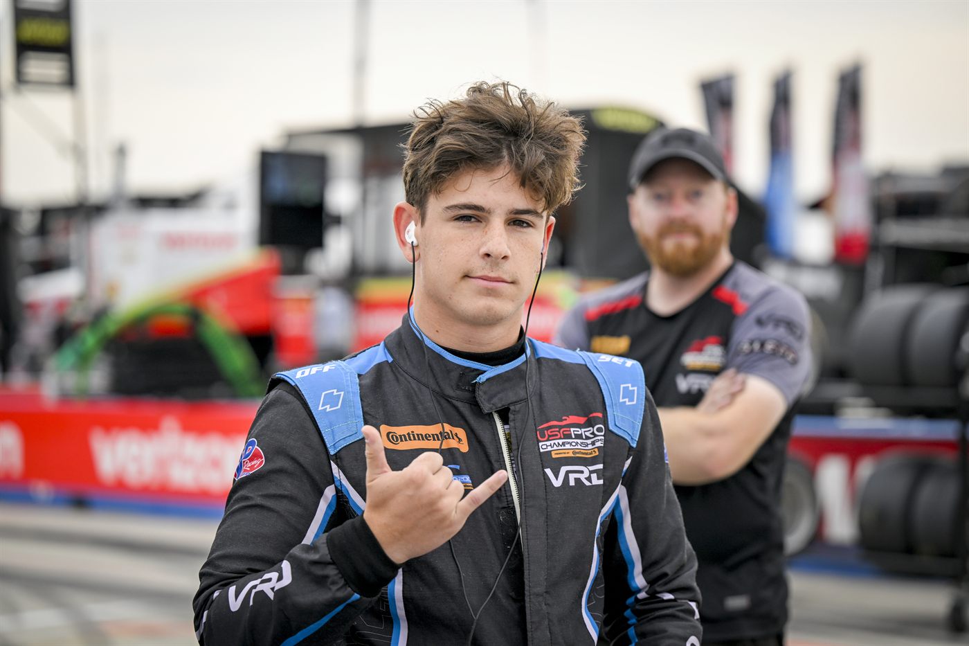 Teddy Musella in the paddock at the Milwaukee Mile in his VRD Racing suit.